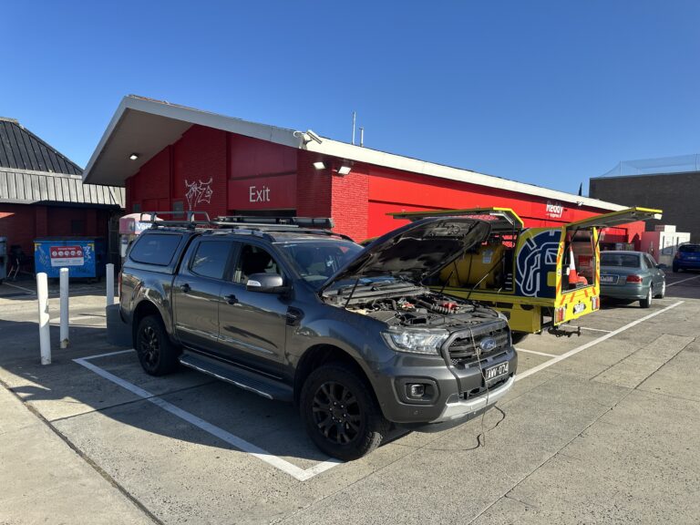 Wrong fuel rescue southern suburbs Melbourne — Rapid Fuel Assist draining petrol from diesel Ford Ranger at service station Frankston