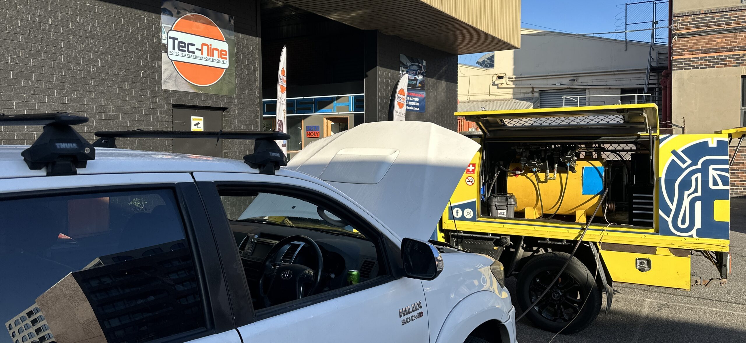 Rapid Fuel Assist mobile wrong fuel rescue truck parked outside Tec-Nine Porsche specialist workshop in Brunswick Melbourne