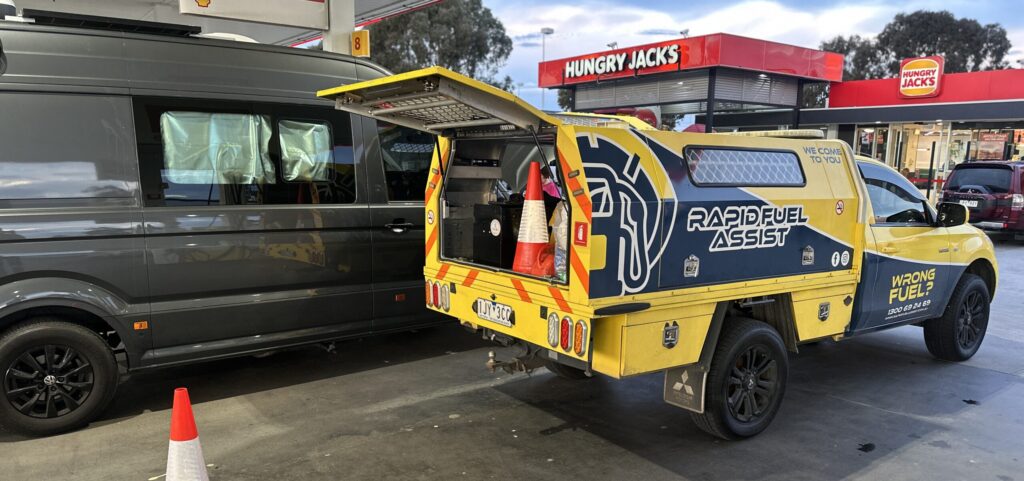 Rapid Fuel Assist wrong fuel recovery vehicle beside a VW Crafter camper van at Kalkallo, bonnet up, engine not started